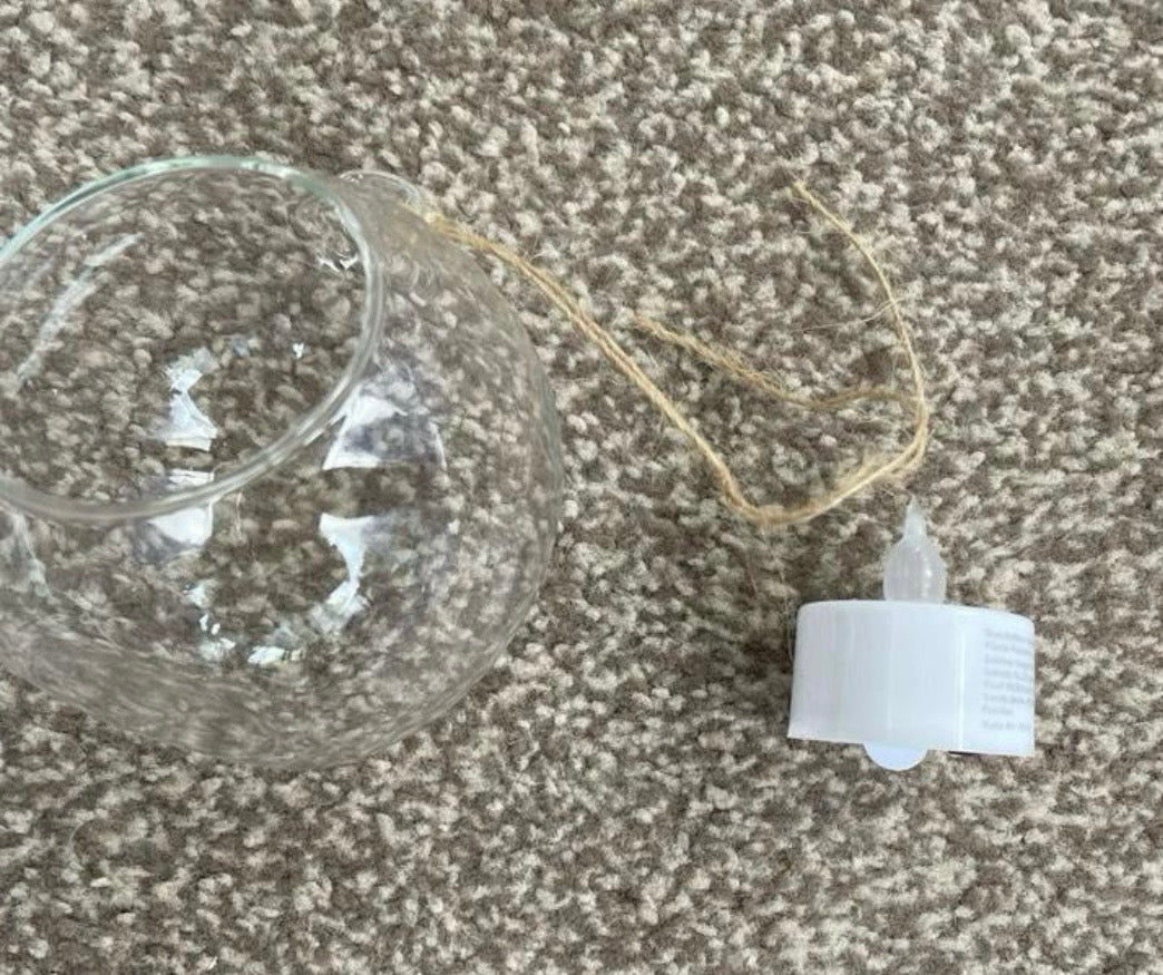Metal Floral Centrepiece with Ivy white roses transparent hanging sphere and LED candle